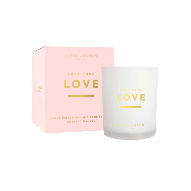 Katie Loxton Sentiment Candle with ‘Love Love Love’ message, glass jar design, tropical papaya and hibiscus scent.