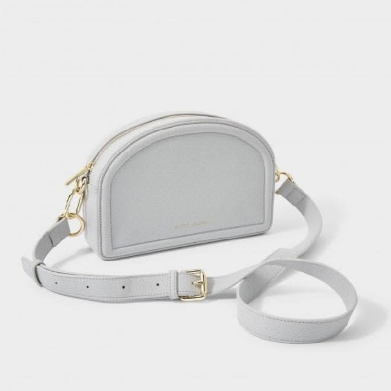 Keira Half Moon Bag in pale blue with chain-link strap detail.