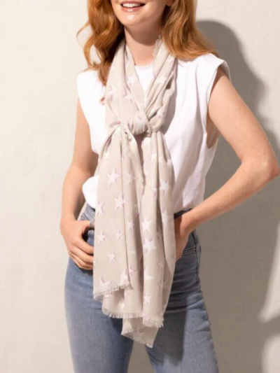 Katie Loxton star print scarf in oyster and lilac.