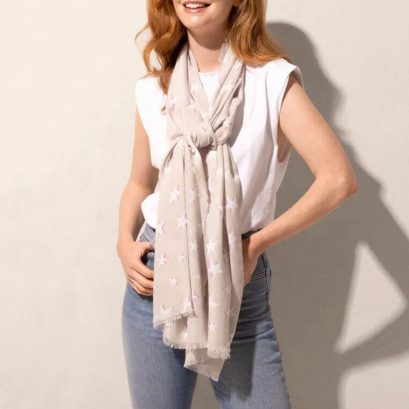 Katie Loxton star print scarf in oyster and lilac.