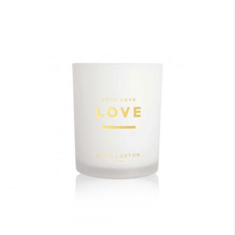 Katie Loxton Sentiment Candle with ‘Love Love Love’ message, glass jar design, tropical papaya and hibiscus scent.