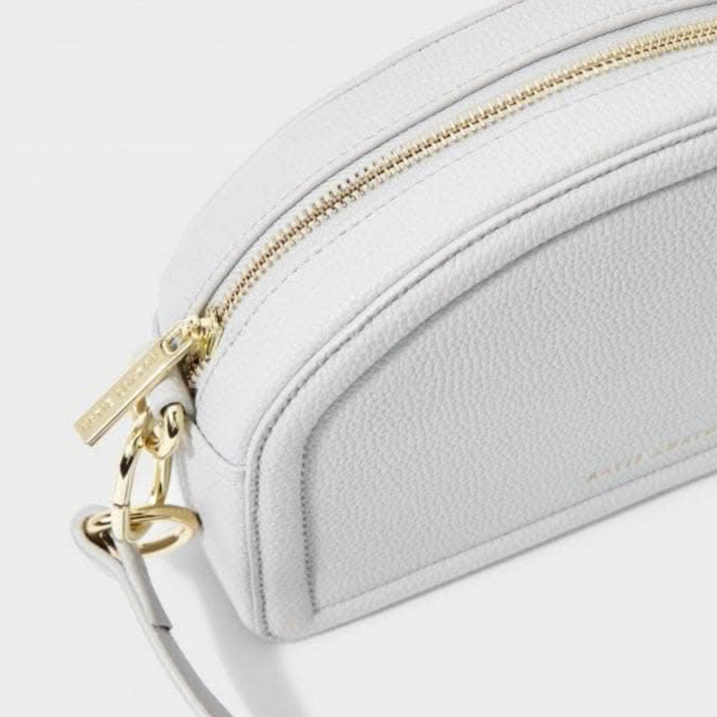 Keira Half Moon Bag in pale blue with chain-link strap detail.