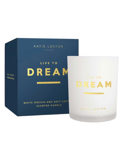 Katie Loxton Sentiment Candle in glass jar with ‘Live To Dream’ message, white orchid and soft cotton fragrance.