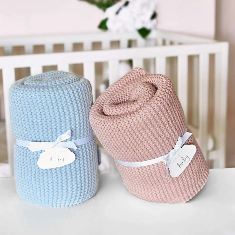 Katie Loxton pink cotton knitted baby blanket.