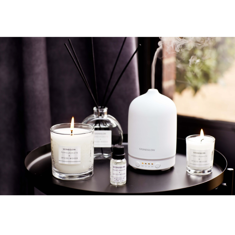 Pomegranate & Spiced Woods scented candle in luxury boxed tumbler.