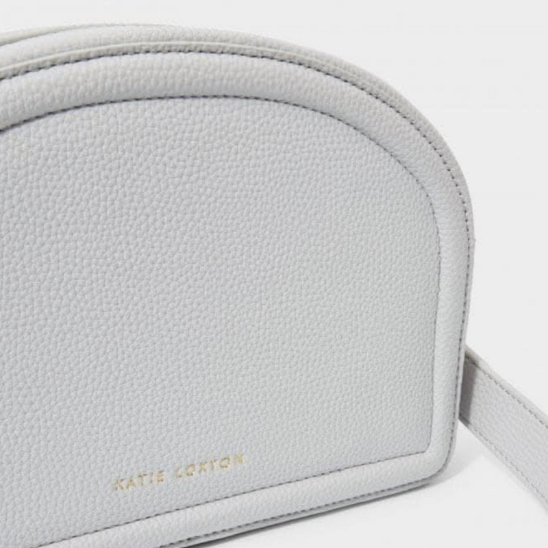 Keira Half Moon Bag in pale blue with chain-link strap detail.