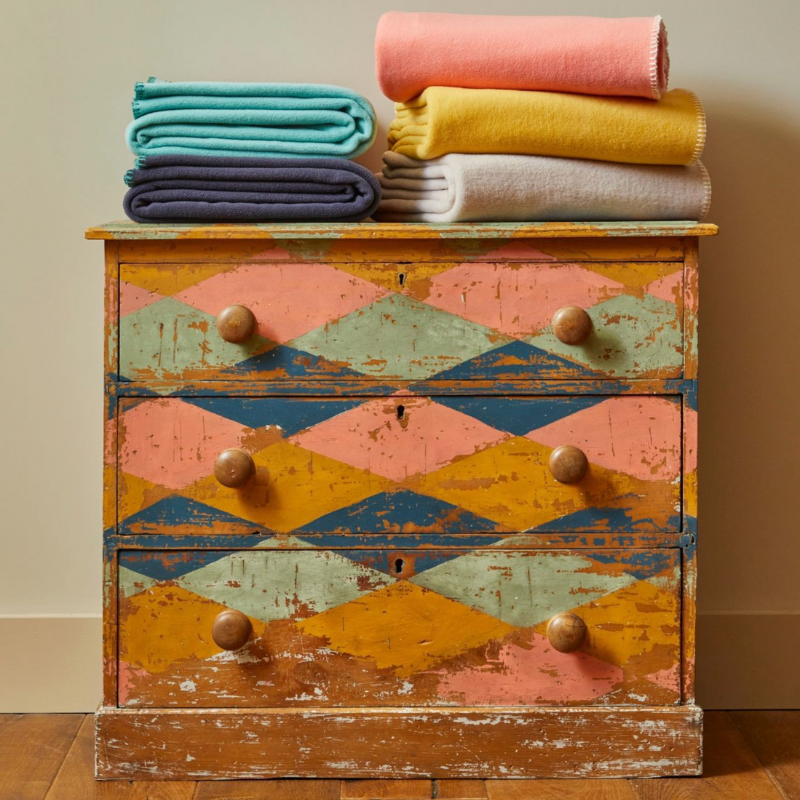 Sand Cornwall fleece throws folded neatly with soft fleece texture