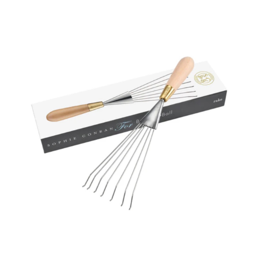 Sophie Conran stainless steel hand rake with FSC beech wood handle and brass ferrule in presentation gift box.
