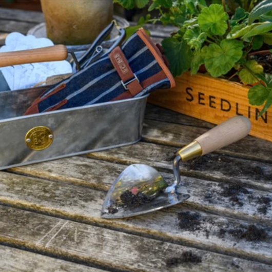 Sophie Conran heart-shaped stainless steel garden trowel with FSC beech wood handle and brass ferrule in presentation gift box.